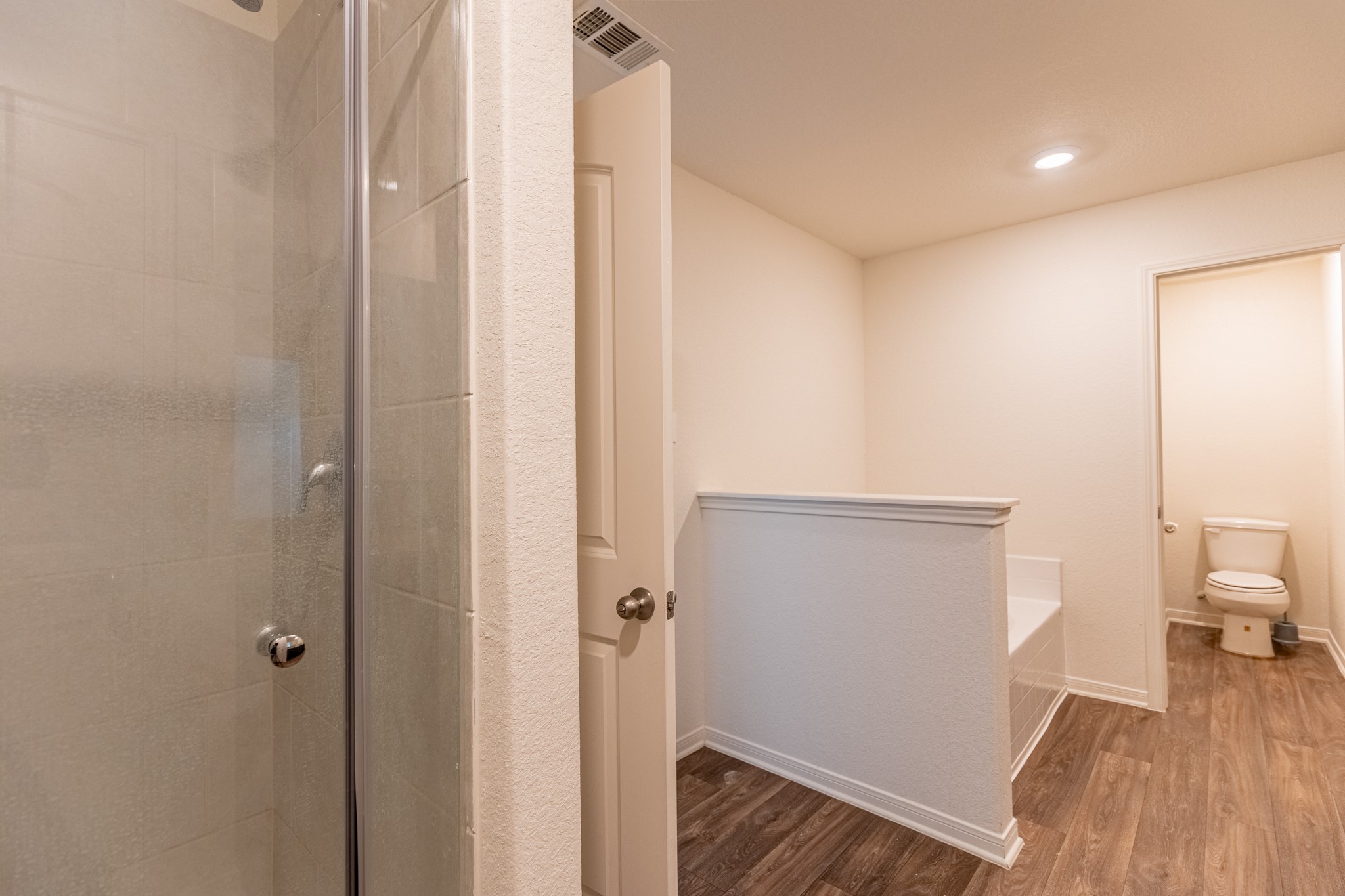 18628 Quiet Range Drive Elgin, TX 78621 - Photo 17 of 32 a view of room with wooden floor