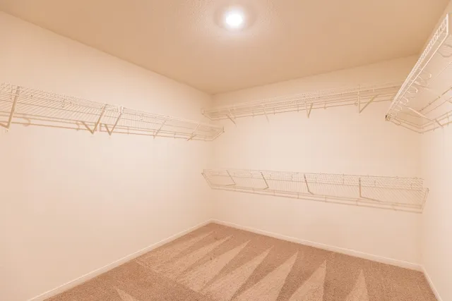 a view of room with wooden floor