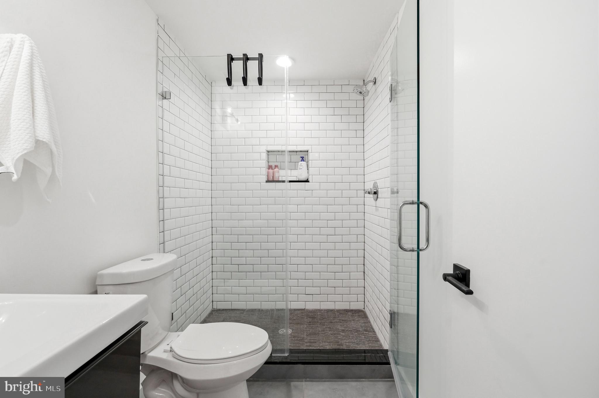2604 Reed Street Philadelphia, PA 19146 - Photo 26 of 45 a bathroom with a toilet and a shower