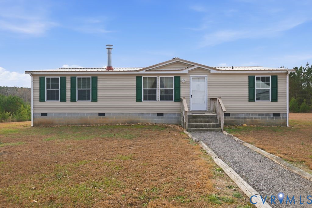25825 Ridge Lane McKenney, VA 23872 - Photo 1 of 48 a front view of a house with a yard