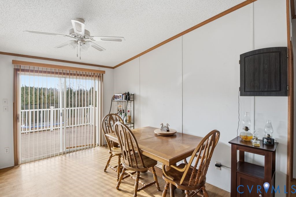 25825 Ridge Lane McKenney, VA 23872 - Photo 11 of 48 a view of a dining room with furniture and wooden floor