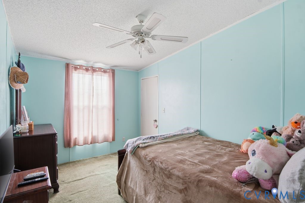 25825 Ridge Lane McKenney, VA 23872 - Photo 18 of 48 a bedroom with a bed and a window