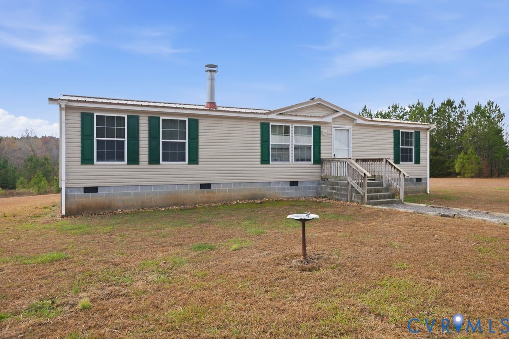 25825 Ridge Lane McKenney, VA 23872 - Photo 2 of 48 a front view of a house with a yard