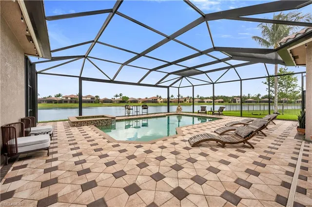 a view of swimming pool with a patio