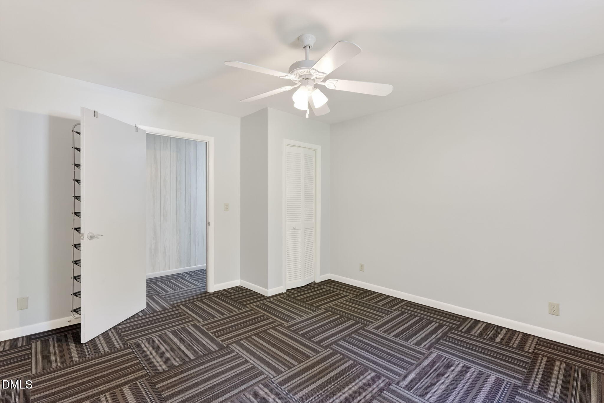 5363 Scottie Godwin Road Wade, NC 28395 - Photo 21 of 87 a view of a bedroom with wooden floor