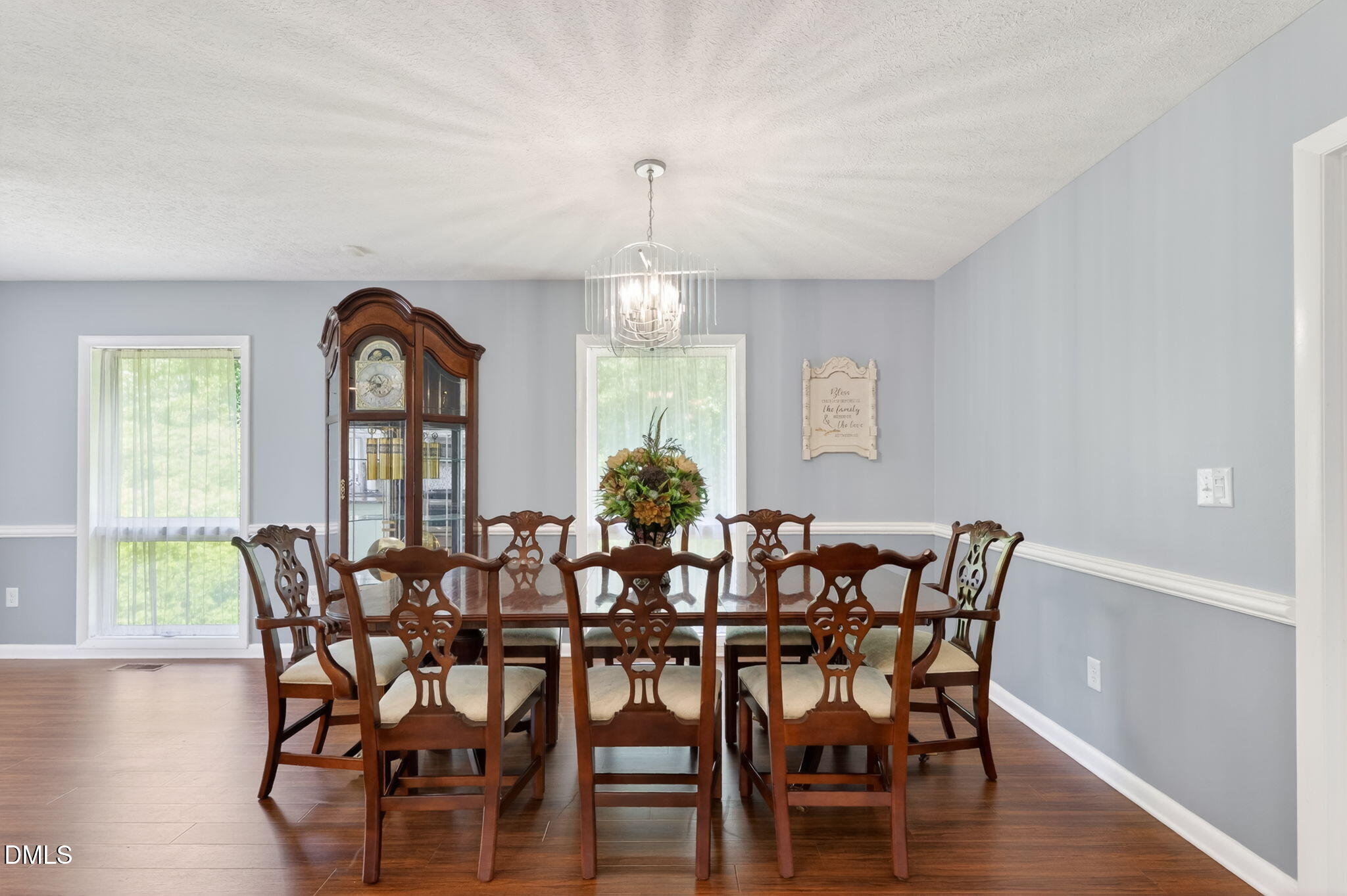 5363 Scottie Godwin Road Wade, NC 28395 - Photo 39 of 87 a view of a dining room with furniture window and wooden floor