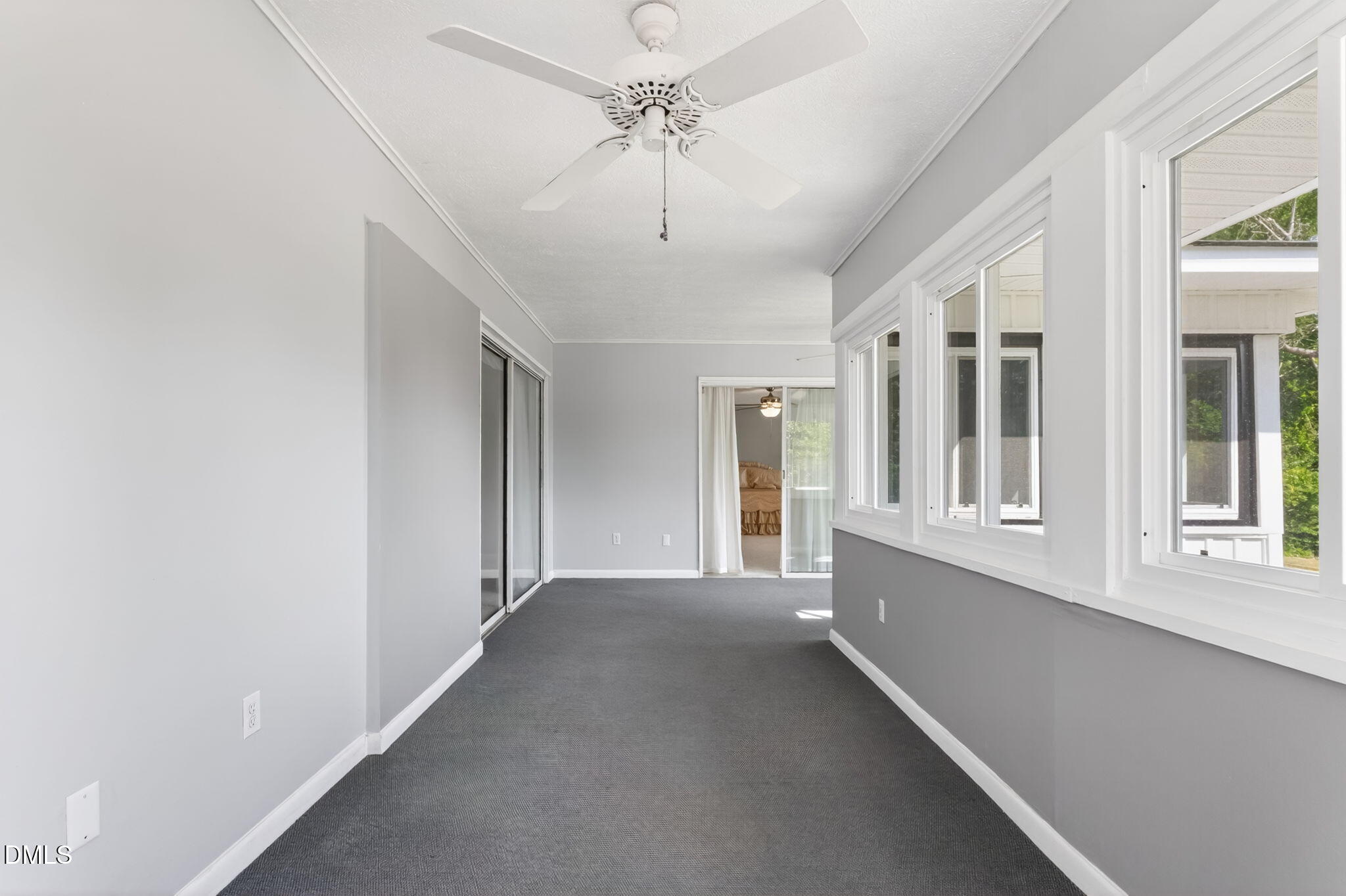 5363 Scottie Godwin Road Wade, NC 28395 - Photo 52 of 87 a view of a hallway with windows