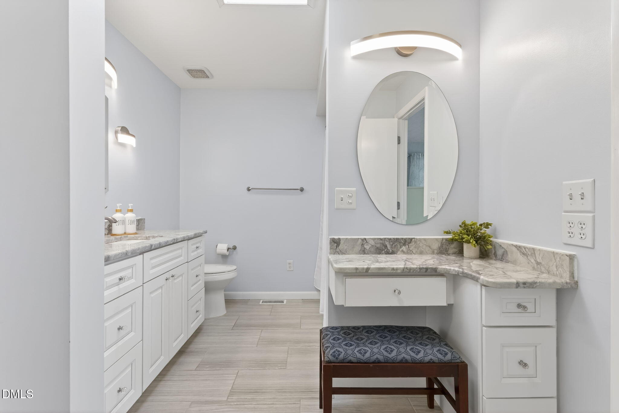 5363 Scottie Godwin Road Wade, NC 28395 - Photo 53 of 87 a bathroom with a sink and a mirror