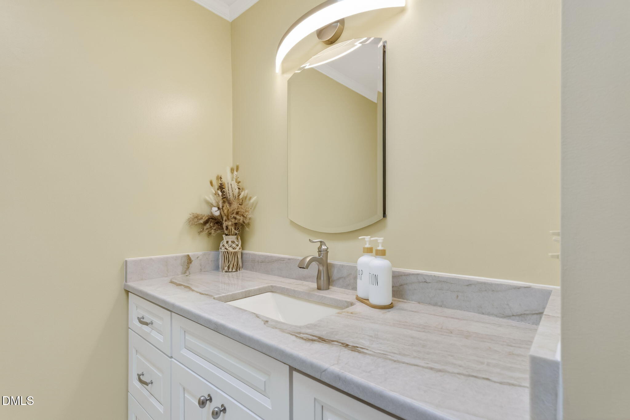 5363 Scottie Godwin Road Wade, NC 28395 - Photo 60 of 87 a bathroom with a granite countertop sink and a mirror