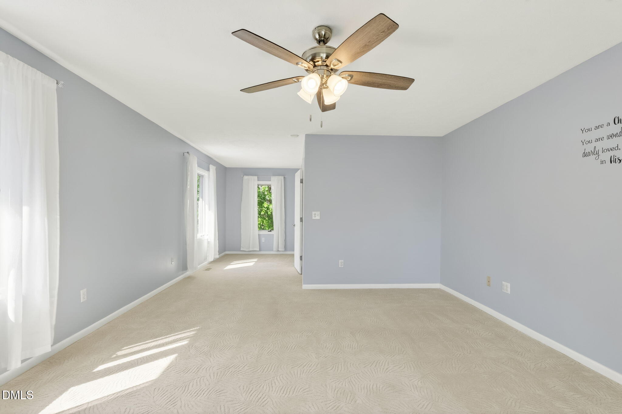 5363 Scottie Godwin Road Wade, NC 28395 - Photo 66 of 87 an empty room with windows and fan
