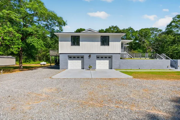 a kitchen with stainless steel appliances a sink stove and refrigerator