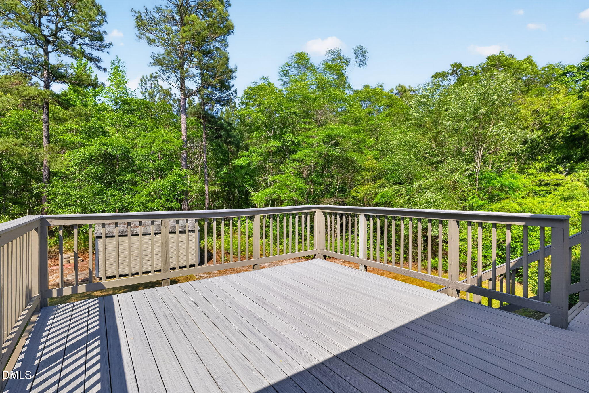5363 Scottie Godwin Road Wade, NC 28395 - Photo 71 of 87 a view of balcony with wooden floor and fence