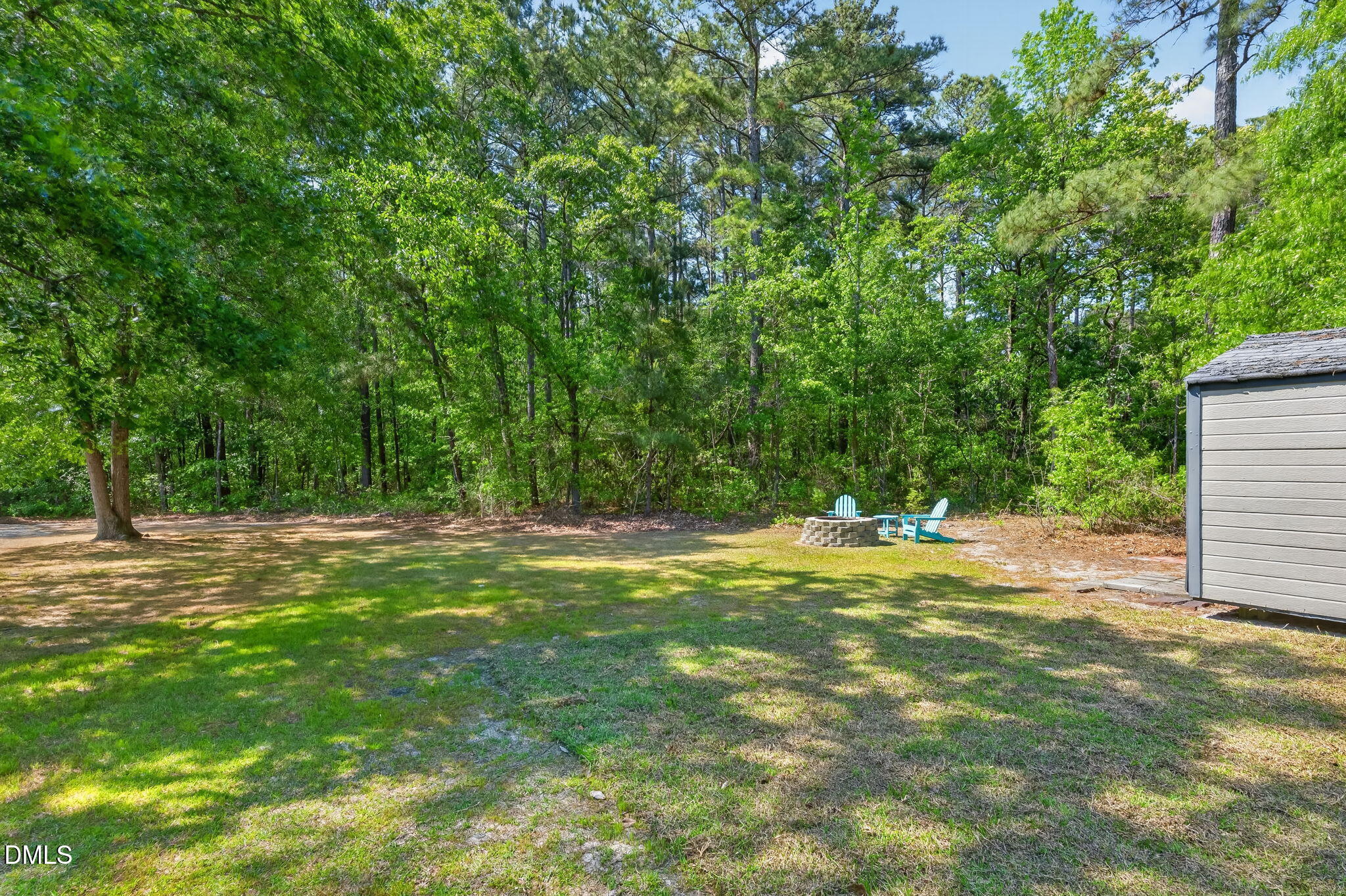 5363 Scottie Godwin Road Wade, NC 28395 - Photo 79 of 87 a view of a yard with a house