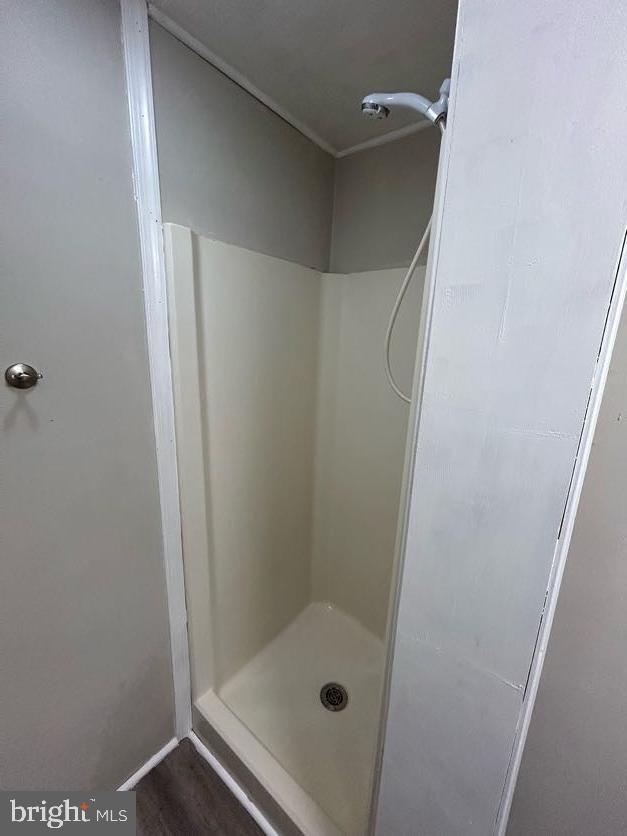 15471 U.S. Rte 1 Woodford, VA 22580 - Photo 20 of 74 a bathroom with a glass door shower