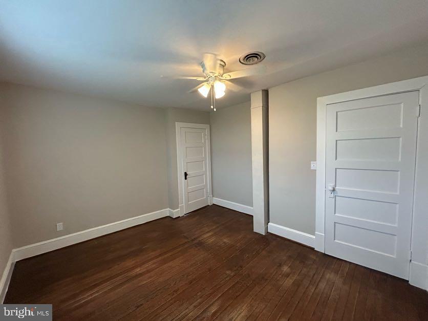 15471 U.S. Rte 1 Woodford, VA 22580 - Photo 24 of 74 a view of an empty room and wooden floor