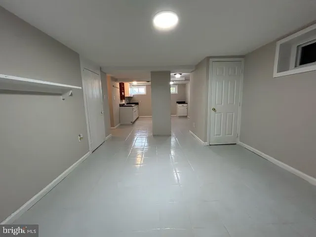 an aerial view of a house with a big yard