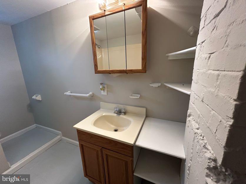 15471 U.S. Rte 1 Woodford, VA 22580 - Photo 51 of 74 a bathroom with a sink and a vanity