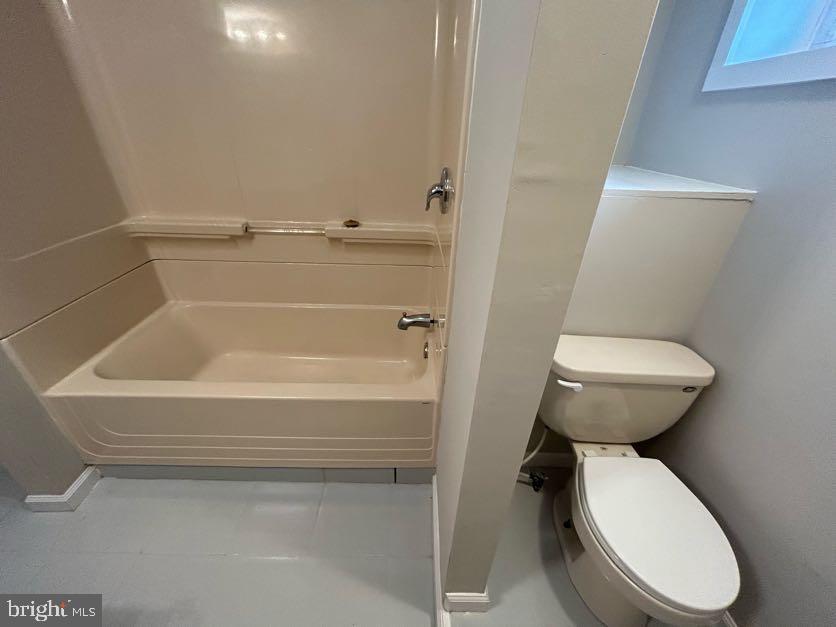 15471 U.S. Rte 1 Woodford, VA 22580 - Photo 53 of 74 a bathroom with a toilet and a sink