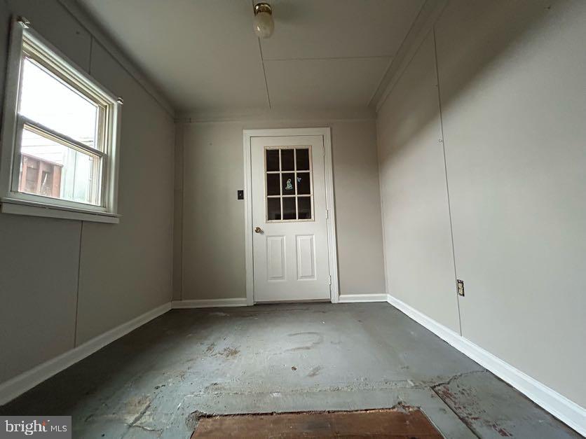 15471 U.S. Rte 1 Woodford, VA 22580 - Photo 59 of 74 an empty room with windows