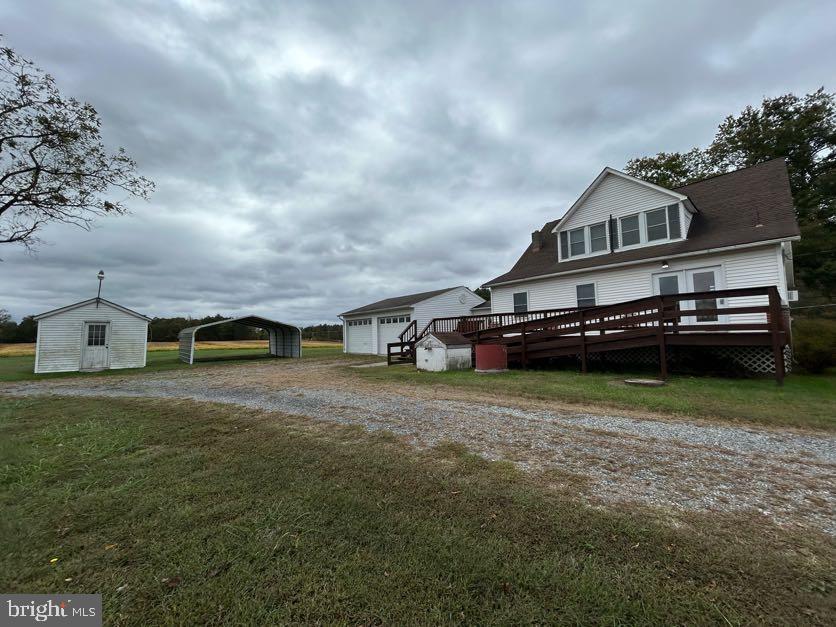 15471 U.S. Rte 1 Woodford, VA 22580 - Photo 62 of 74 an aerial view of a house with a big yard