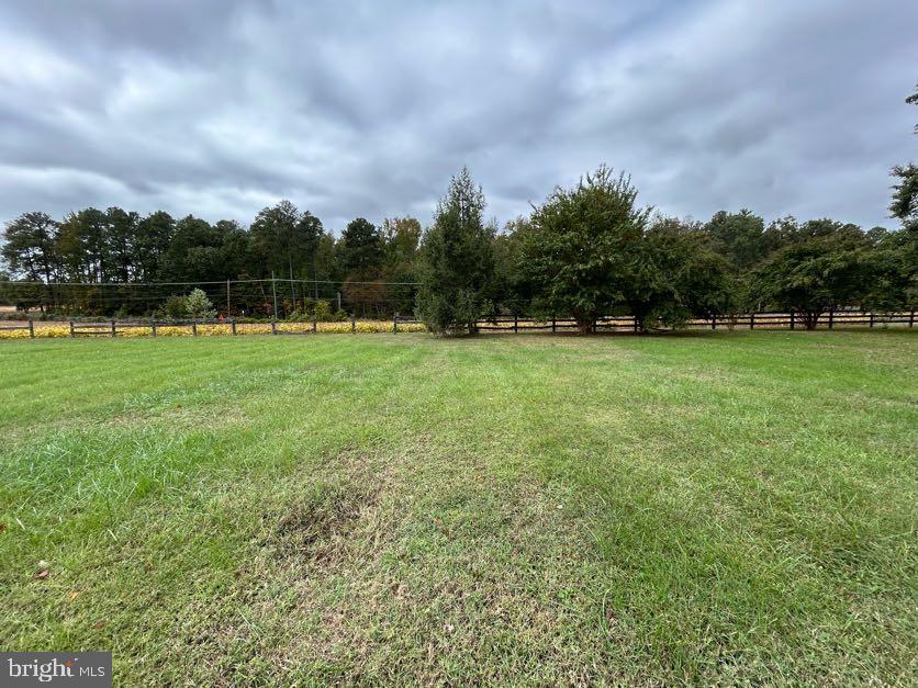 15471 U.S. Rte 1 Woodford, VA 22580 - Photo 70 of 74 a view of outdoor space with field and trees in the background