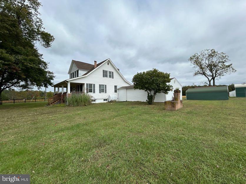 15471 U.S. Rte 1 Woodford, VA 22580 - Photo 71 of 74 a front view of a house with garden