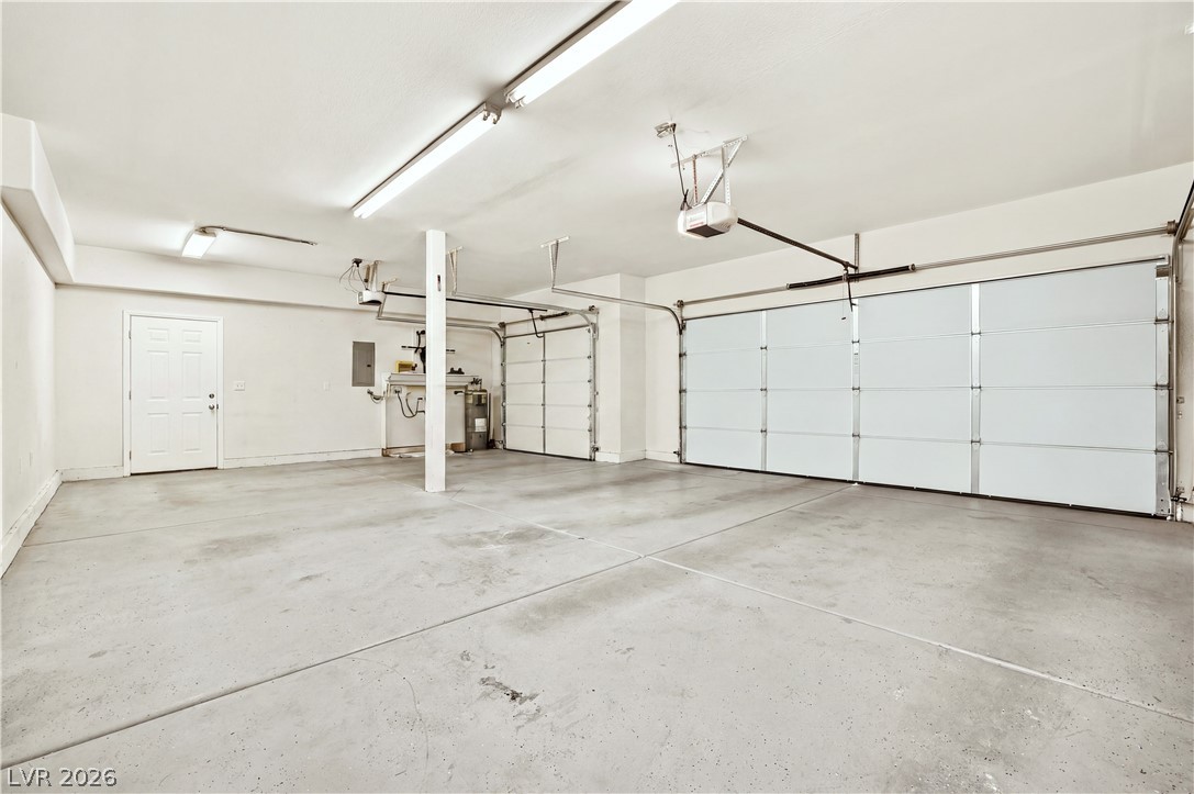 1135 Calico Ridge Drive Henderson, NV 89011 - Photo 54 of 86 A spacious garage offers ample vehicle and storage space.