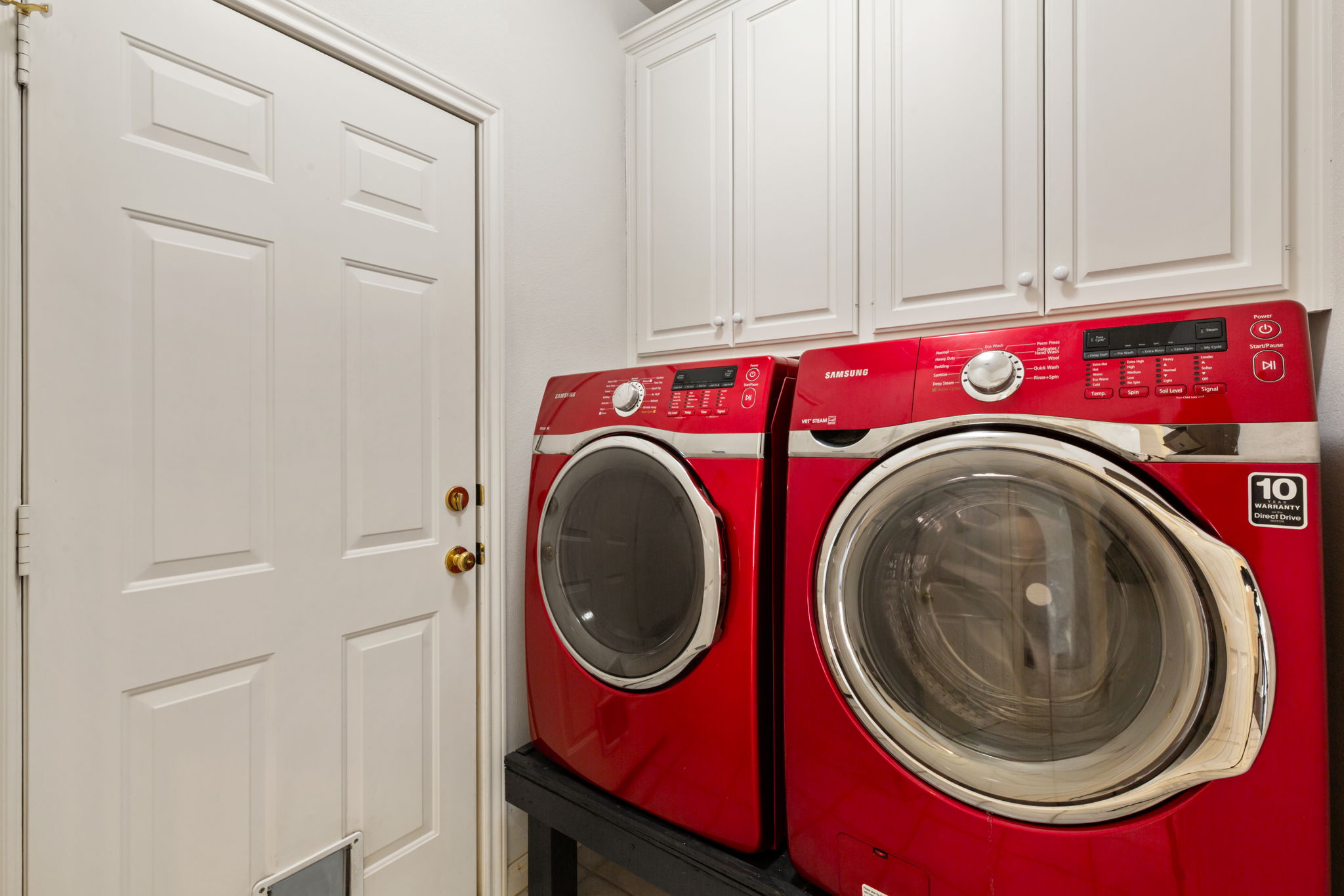 109 Riverview Drive Georgetown, TX 78628 - Photo 17 of 35 Laundry room featuring independent washer and dryer and cabinet space