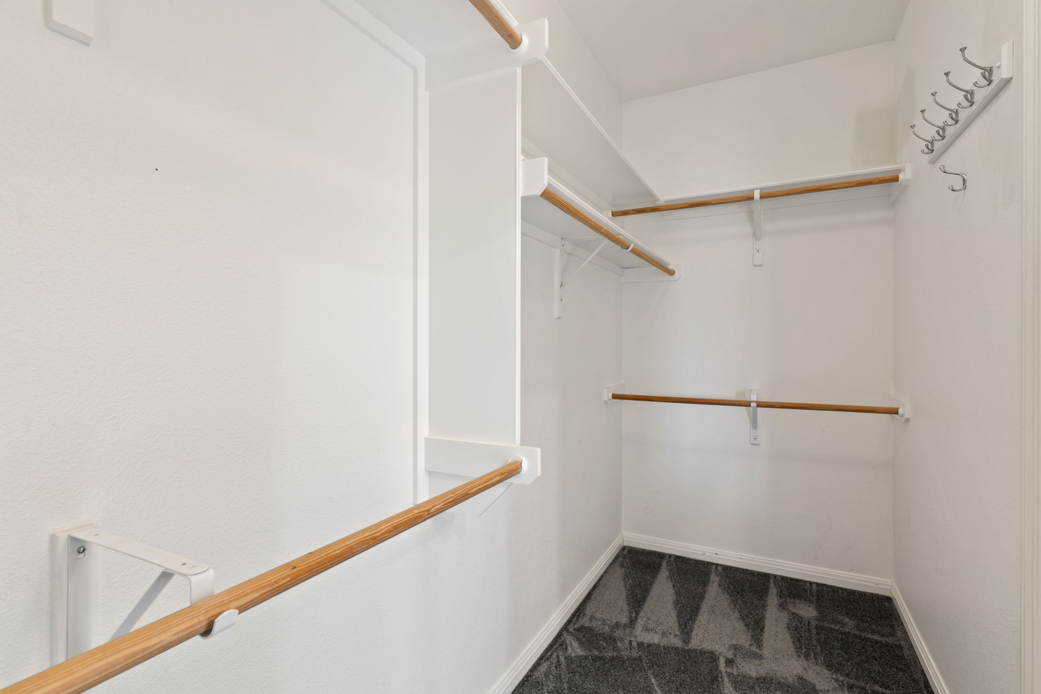 109 Riverview Drive Georgetown, TX 78628 - Photo 24 of 35 Walk in closet featuring dark colored carpet