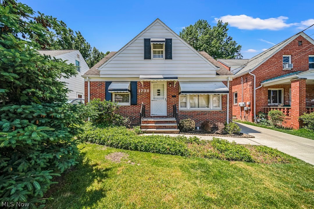 View of front of home with a front yard