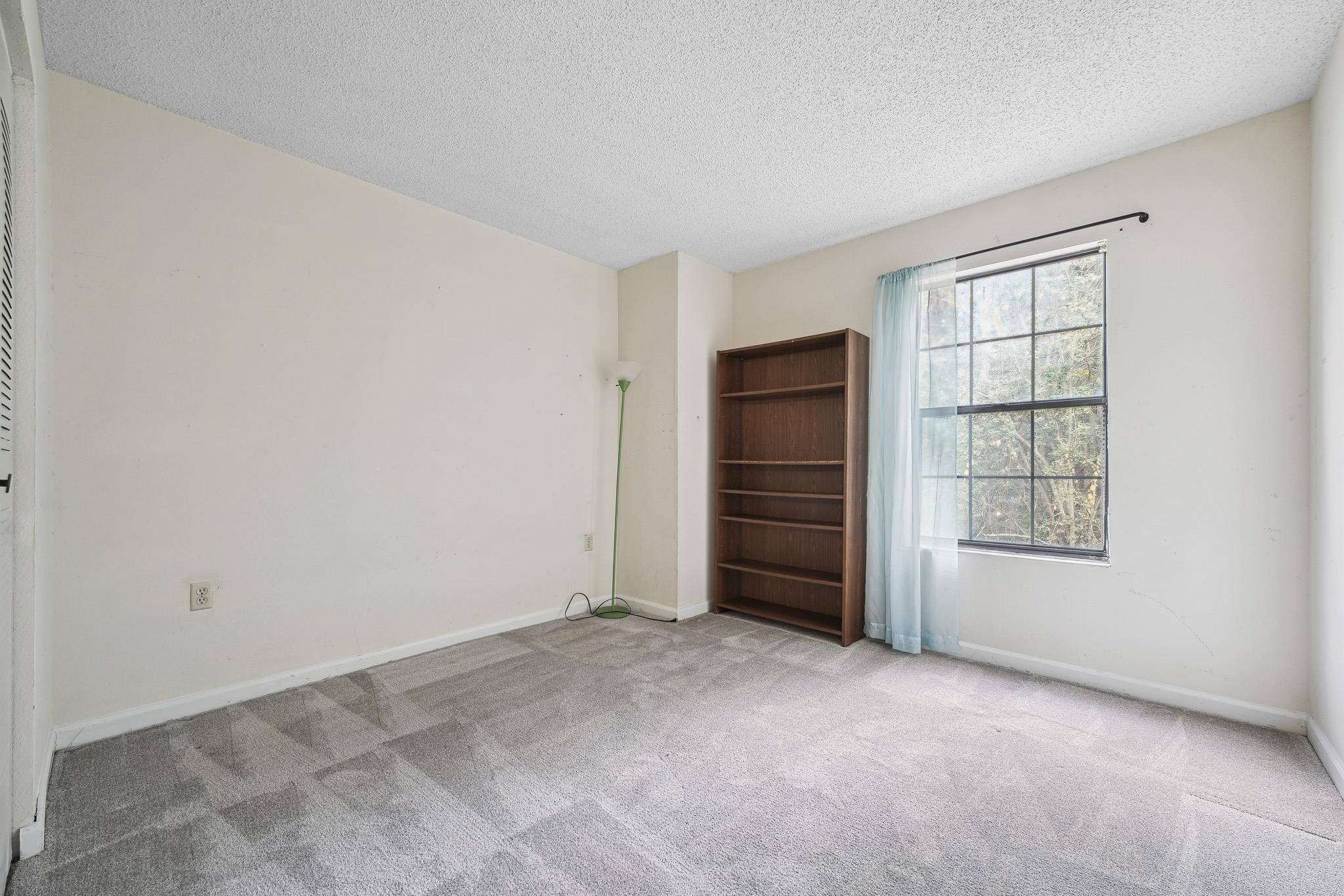 7632 Falcon Rest Circle, Unit 7632 Raleigh, NC 27615 - Photo 17 of 26 a view of empty room with closet and cabinet