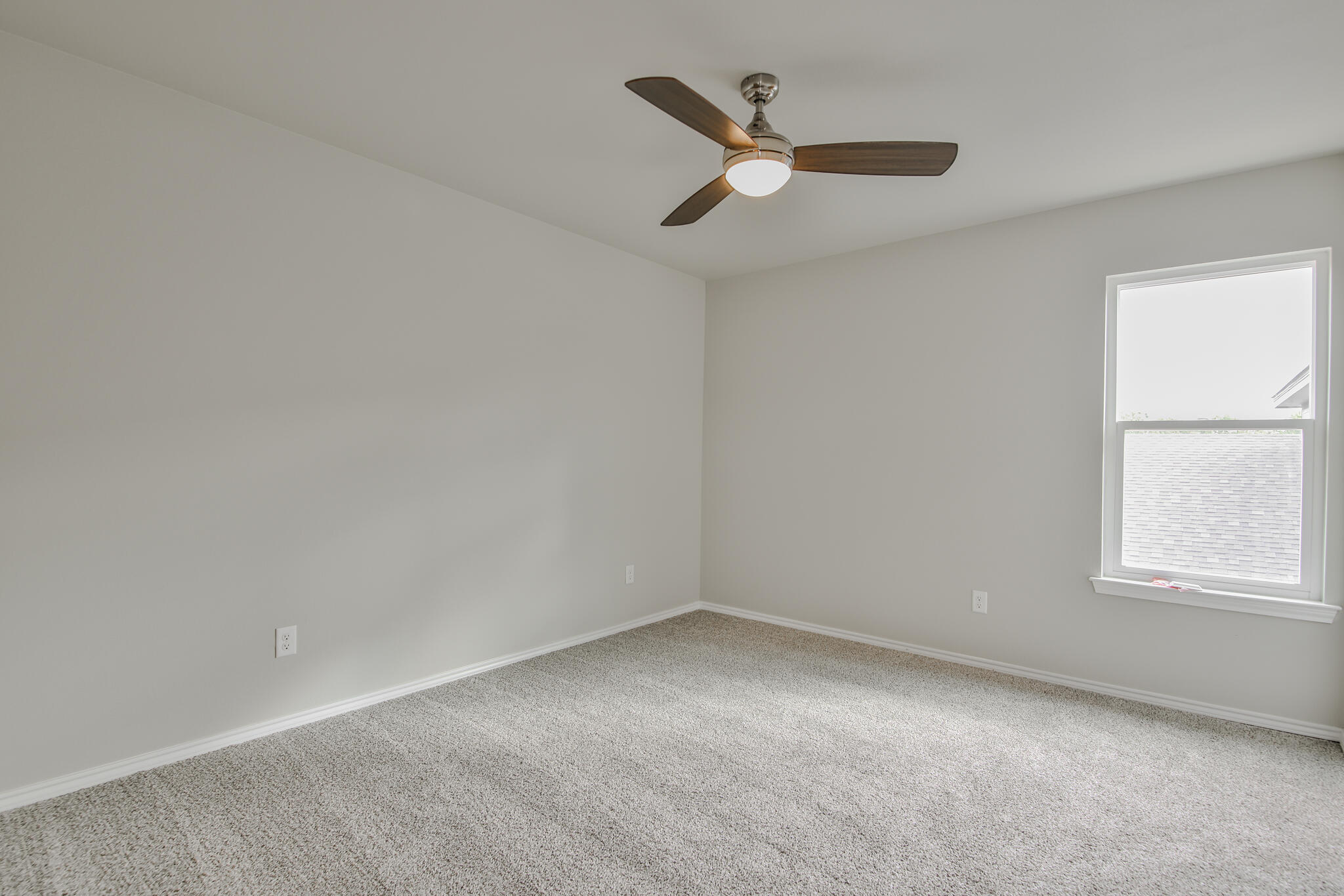 3115-3117 74th Street Lubbock, TX 79423 - Photo 28 of 37 an empty room with a window