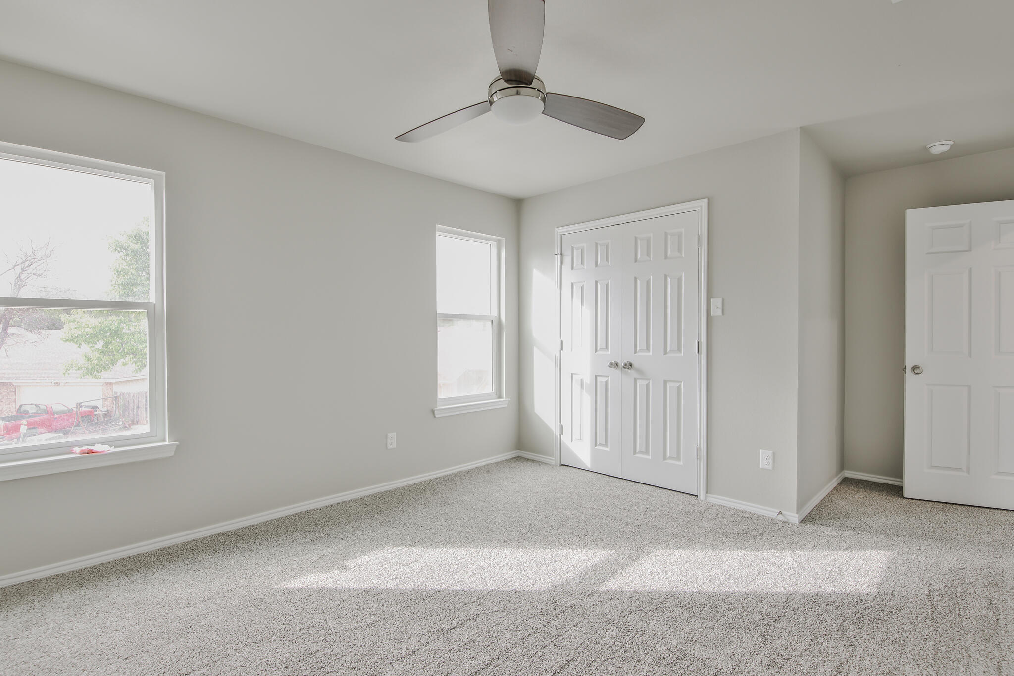 3115-3117 74th Street Lubbock, TX 79423 - Photo 34 of 37 a view of an empty room with a window