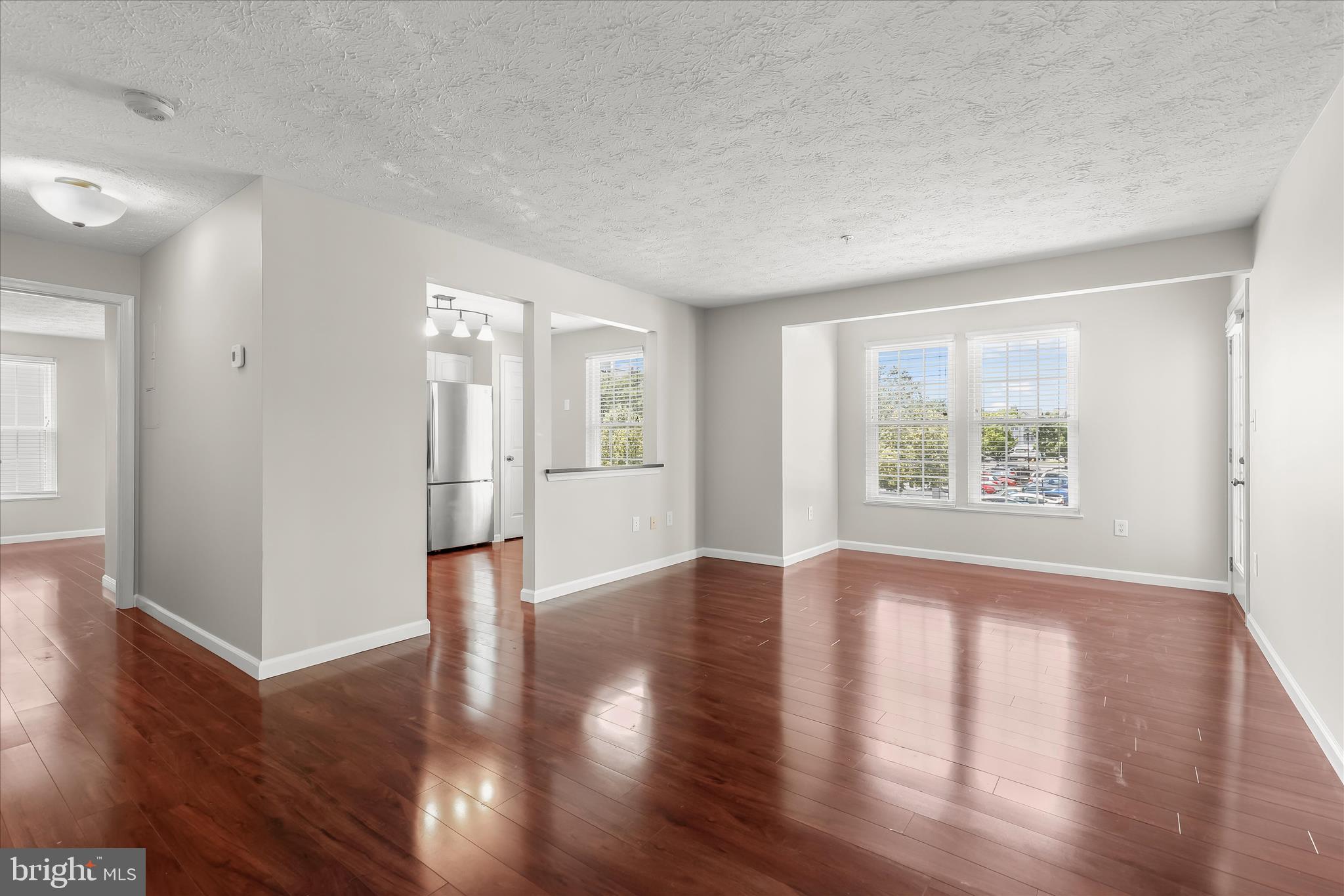 687 Winding Stream Way, Unit 204 Odenton, MD 21113 - Photo 35 of 36 Open floor plan with gleaming hardwood flooring