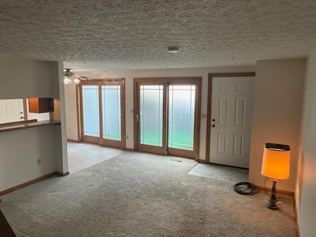 707 Cherry Hollow Road, Unit C Columbus, OH 43228 - Photo 7 of 21 view from living room to dining area and beautiful double glass sliding doors that lead to privacy fenced patio.