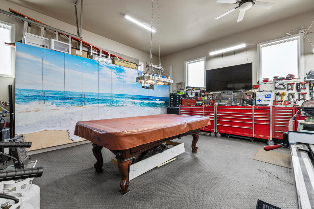 11629 Merganser Road Klamath Falls, OR 97601 - Photo 29 of 50 a room with pool table and flat screen tv