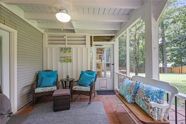 a outdoor living space with furniture and garden view