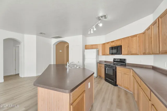 a bathroom with a bathtub and a sink