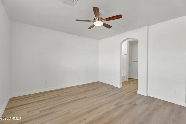 a house with a swimming pool in front of it