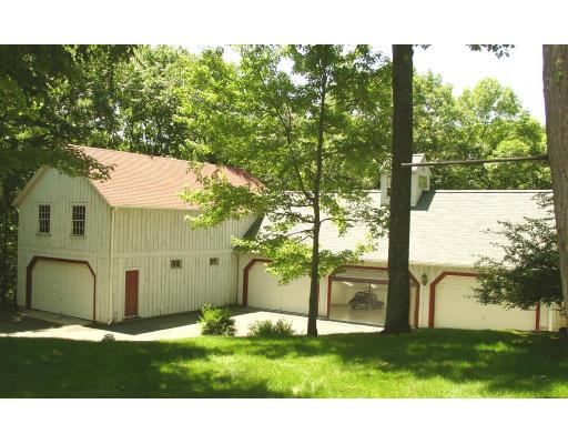 35 Bowditch Road Sudbury, MA 01776 - Photo 3 of 12 a view of a park with large trees