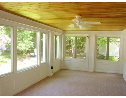 35 Bowditch Road Sudbury, MA 01776 - Photo 10 of 12 a view of an empty room with a window