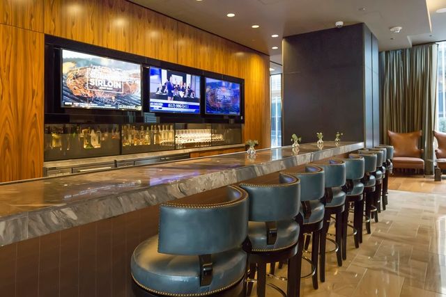 a kitchen with a table and chairs