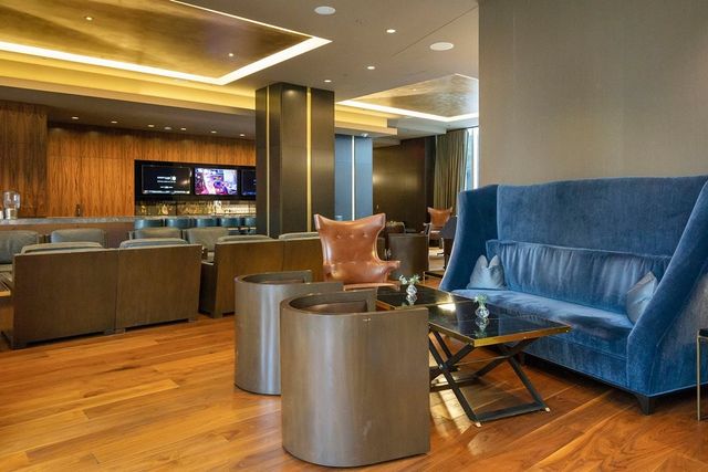 a kitchen with a table and chairs