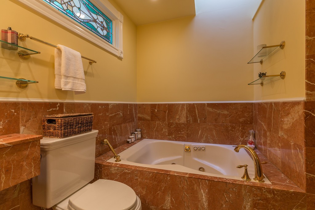 37 Bay State Road, Unit 6 Boston, MA 02215 - Photo 19 of 25 a bathroom with a sink and toilet