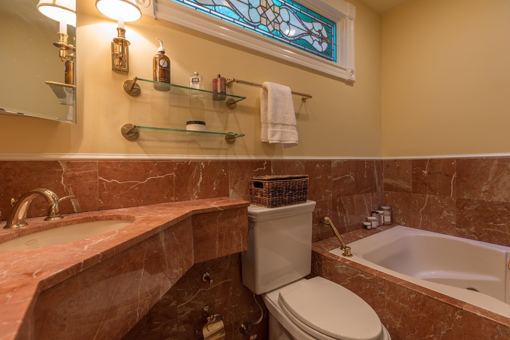 37 Bay State Road, Unit 6 Boston, MA 02215 - Photo 20 of 25 a bathroom with a sink a toilet and bathtub