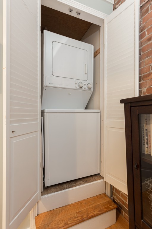 37 Bay State Road, Unit 6 Boston, MA 02215 - Photo 22 of 25 a utility room with washer and dryer