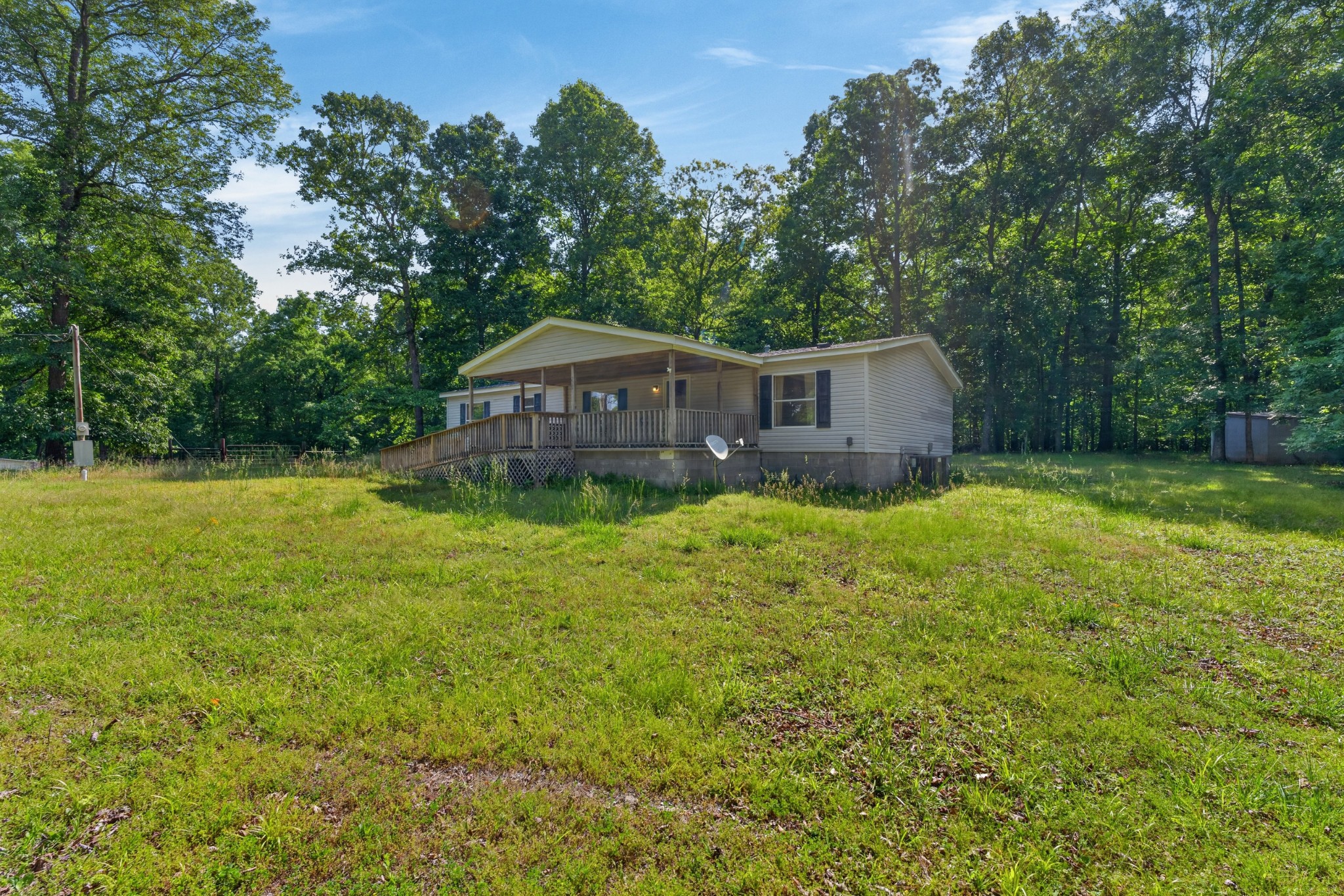 228 Shasteen Ridge Road Lynchburg, TN 37352 - Photo 39 of 53 a view of a house with a yard