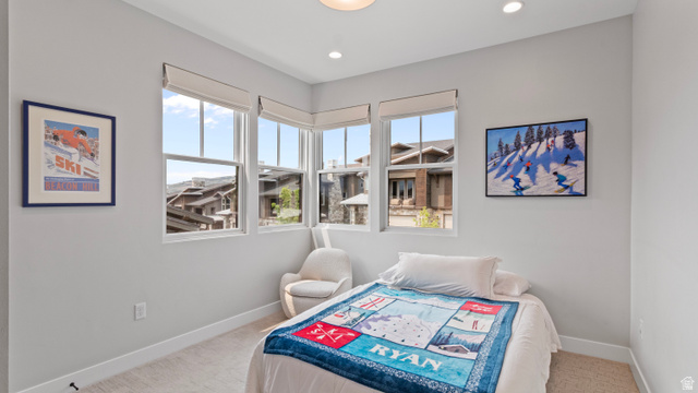355 East Overlook Loop Hideout, UT 84036 - Photo 21 of 40 Main floor bedroom next to a full bathroom.