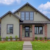 a front view of house with a yard