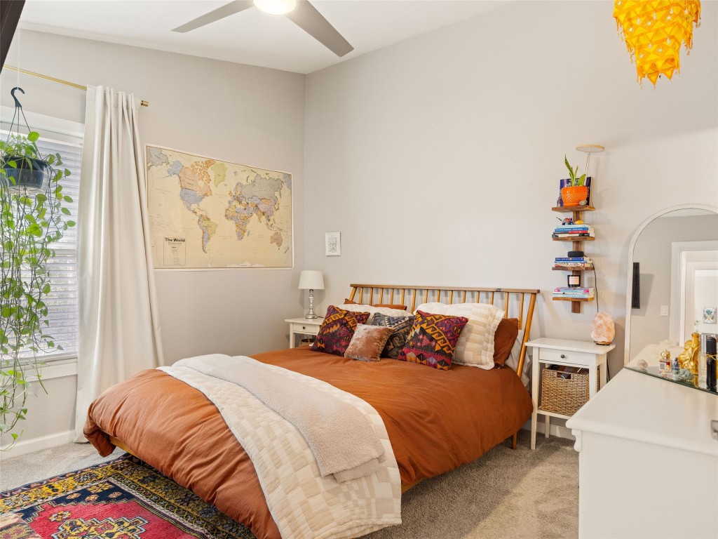 1307 East St Johns Avenue, Unit B Austin, TX 78752 - Photo 12 of 27 a bedroom with a bed and a window